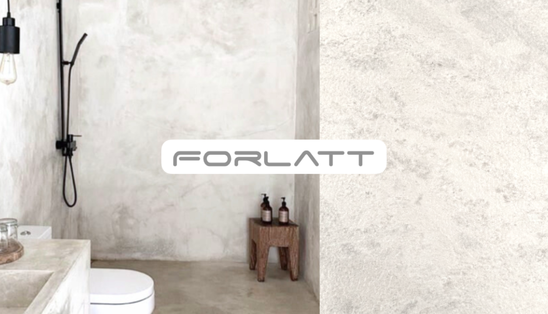 Baño moderno con paredes de placas decorativas Forlatt y ducha, detalles en madera y elementos minimalistas.