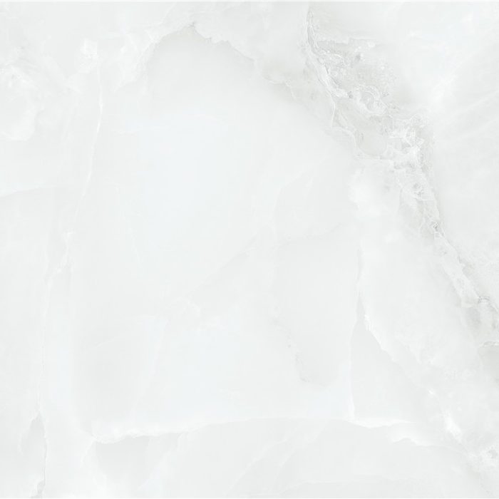 Azulejo de mármol blanco y suave con vetas sutiles en tonos grises.